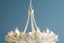 a beautiful white magnolia chandelier will bring an ethereal touch and chic to your space