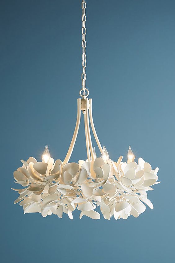 a beautiful white magnolia chandelier will bring an ethereal touch and chic to your space