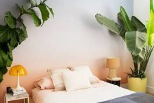 a bright gradient wall from blue to orange will immediately make your guest room bright and inviting