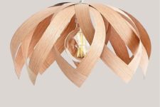 a chic and simple plywood flower pendant lamp is a very creative piece to rock in a modern interior