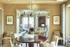 a neutral contemporary living room spruced up with a gold ceiling that adds shine to your space