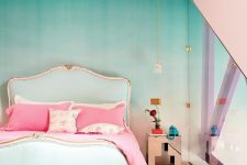 a refined bedroom with an ombre green accent wall, a refined and chic mint bed with pink bedding, a metallic nightstand