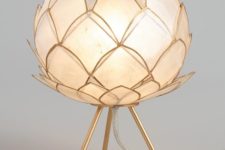 a super elegant neutral flower-shaped table lamp with a gold edge will bring chic to your space