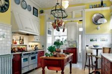a vintage kitchen with bold yellow walls, white subway tiles, dark-stained cabinets, a kitchen island and a pan holder