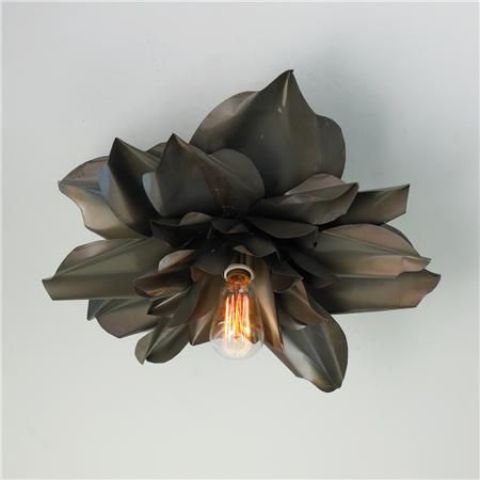 a vintage magnolia blossom ceiling light in black will make a refined and chic statement in your space