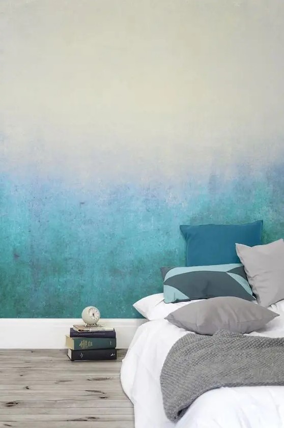 an ombre wall from neutrals to turquoise is a cool way to accent your sleeping space without overdoing it
