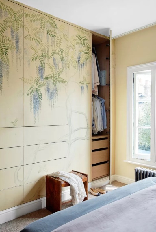 style your wardrobe with a mural, so it will be part of decor and it will fulfill its storage functions at its best