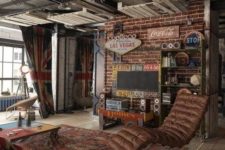 a colorful industrial living room with brick walls, leather furniture, a net ceiling with storage