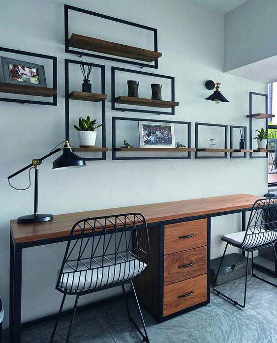 a contemporary style shared home office with industrial furniture   a metal and wood desk, metal chairs, metal and wood open shelving