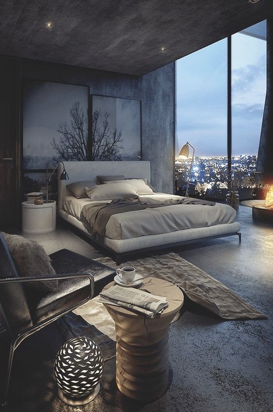 a minimalist industrial bedroom with a glazed wall, luxurious upholstered furniture, chic lamps and built-in lights