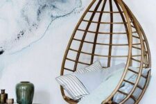 light blue watercolor wallpaper adds a modern feel to the space