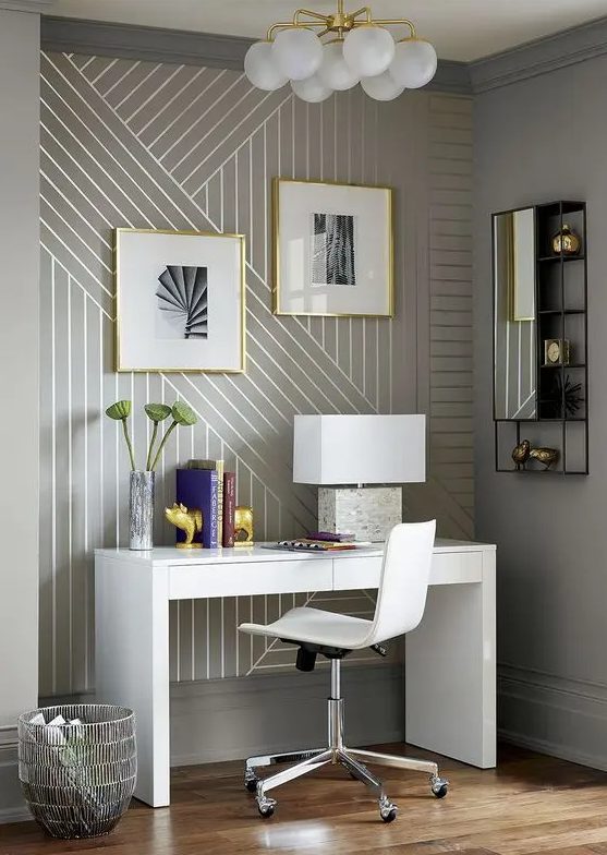 linear wallpaper accentuates this home tiny modern and very refined home office nook and makes it more chic