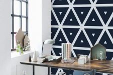 monochromatic geometric self-adhesive wallpaper is a great idea for a modern workspace, to make it bolder and statement-like