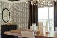 refined geometric wallpaper creates an ambience in this room and exquisite furniture finishes off the look