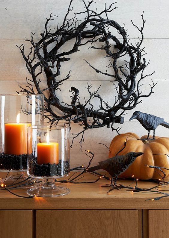 a black branch wreath is a gorgeous idea for Halloween, it's easy to DIY and it looks scary enough to use it