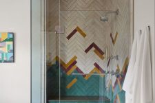 a stylish shower space with color accents