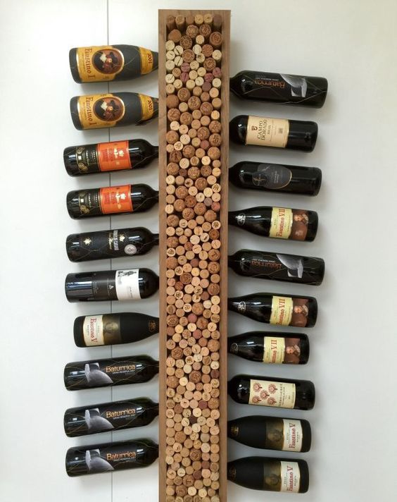 a vertical shelf with wine corks is a creative idea to embrace a home wine bar