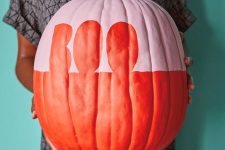 an oversized color block red and pink pumpkin with BOO letters is amazing for Halloween