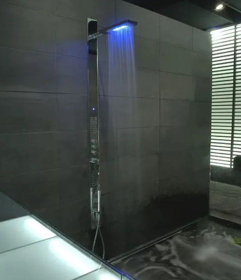 an ultra modern shower panel with LED lights is a cool idea for a any modern bathroom and will make a person relax more
