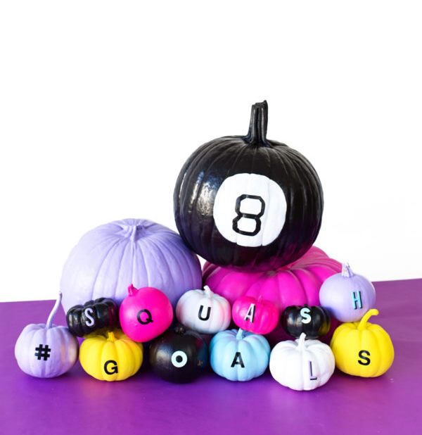 colorful and neon pumpkins with various decor and letters for a bright Halloween party