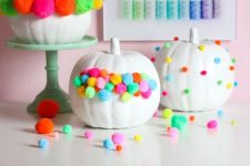 colorful pompom pumpkins will easily fit Halloween, fall and Thanksgiving parties in bold shades