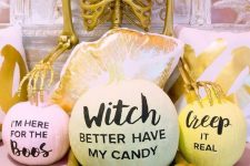 funny pastel pumpkins with phrases that rock are ideal for modern Halloween parties