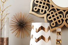 glam gold and brass decor – vases, a mirror in an ornated frame, a sign and others will be amazing for styling your space