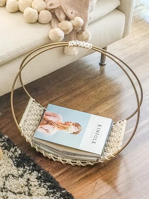 a creative and stylish magazine rack of metal rings and crochet parts is a very chic idea for a modern space and you can DIY one