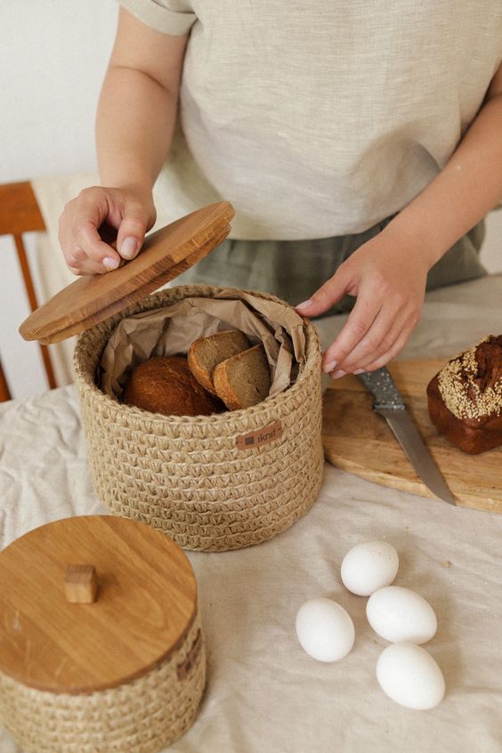 a crochet jar with a wooden lid is a very creative and cool idea for storage and it will make your space more rustic