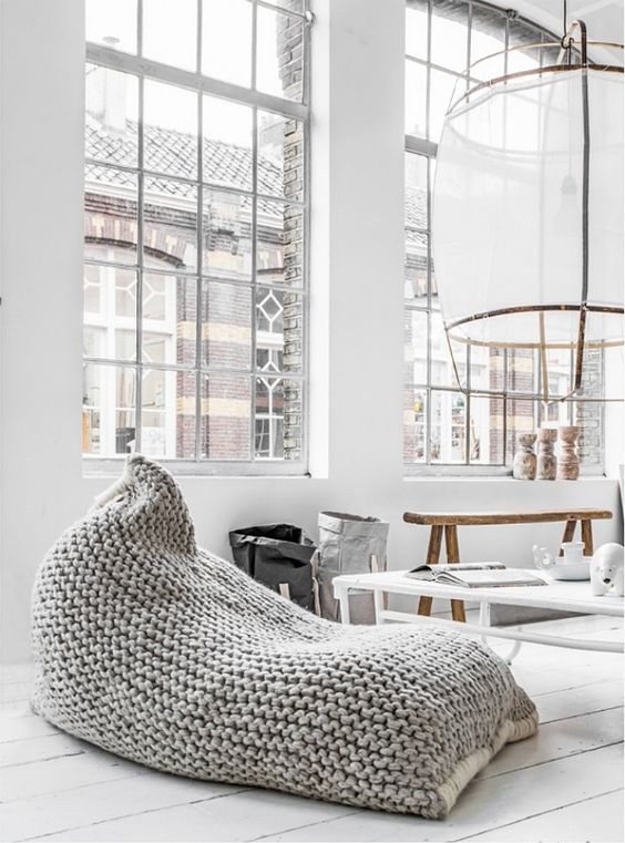 a lovely grey crochered beanbag chair is a cool idea for a Scandinavian space and it's super soft and cozy