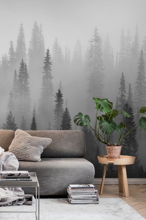 a moody forest wall mural harmonizes the space and makes it more relaxing yet very eye-catching at the same time