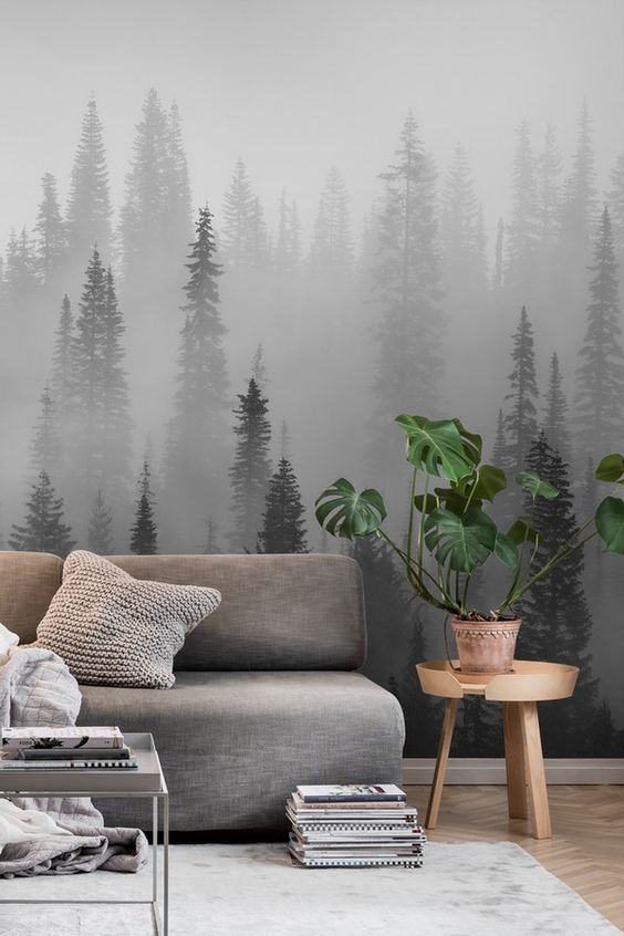 a moody forest wall mural harmonizes the space and makes it more relaxing yet very eye-catching at the same time