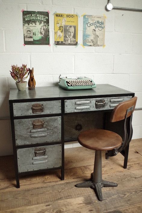 a small vintage industrial desk of metal and a stool of leather and metal is a lovely idea for vintage lovers