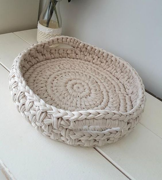 a white crochet basket or holder is a great idea for many homes, just make it hold the shape