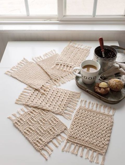 lovely neutral crochet coasters with tassels are amazing for making your table look more boho chic and very relaxed