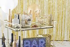 a shiny NYE party bar cart
