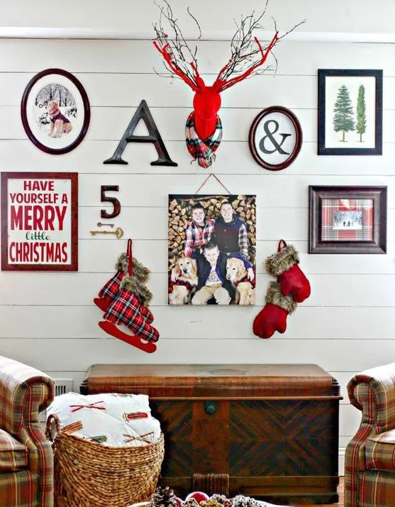 a colorful gallery wall with photos, signs, ice skates, a fake feer head and letters for Christmas