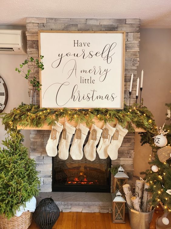 a cool calligraphy Christmas sign with a light-stained frame is a lovely idea for both indoors and outdoors