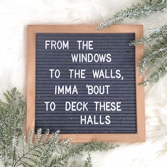 a simple and modern Christmas sign with letters in a frame is a cool idea to style your space for Christmas and not only