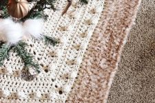 a stylish white and tan knit hexagon tree skirt like this one will make your tree more elegant and chic