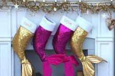 gorgeous fuchsia and gold mermaid stockings are a very whimsical idea that will do for a Christmas beach space