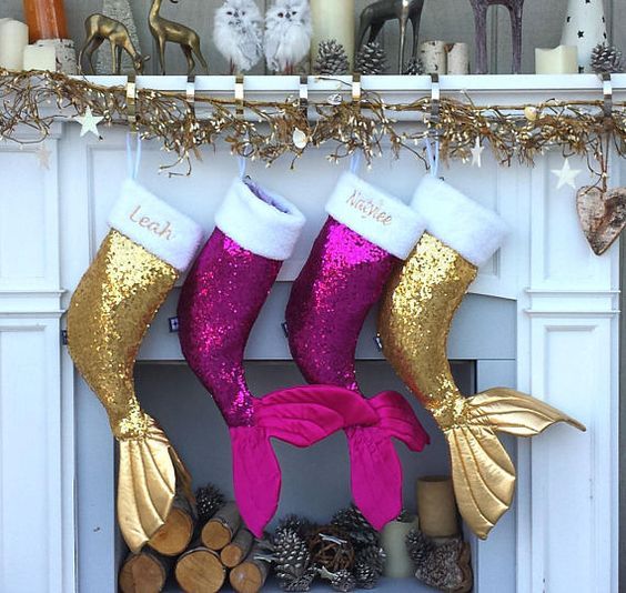 gorgeous fuchsia and gold mermaid stockings are a very whimsical idea that will do for a Christmas beach space