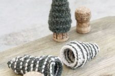 grey and white knit mini Christmas trees like these ones can be put on corks to make little and cute holiday decor
