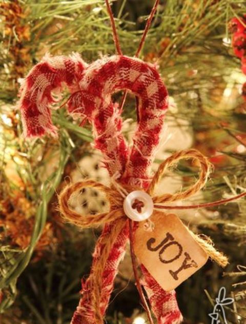 simple rustic Christmas ornaments - plaid candy canes with buttons, twine bows and a tag are amazing for your holiday decor