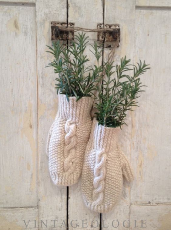 white braided mittens with evergreens are a very simple and super cute holiday decoration you may hang anywhere