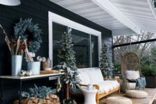 a cozy terrace with an evergreen wreath on a wall