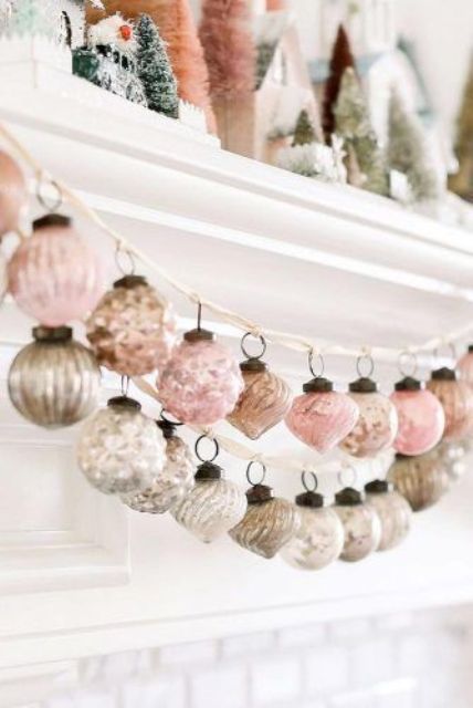 lovely Christmas garlands made of sivler and pink vintage ornaments will be great for Christmas mantels and banisters