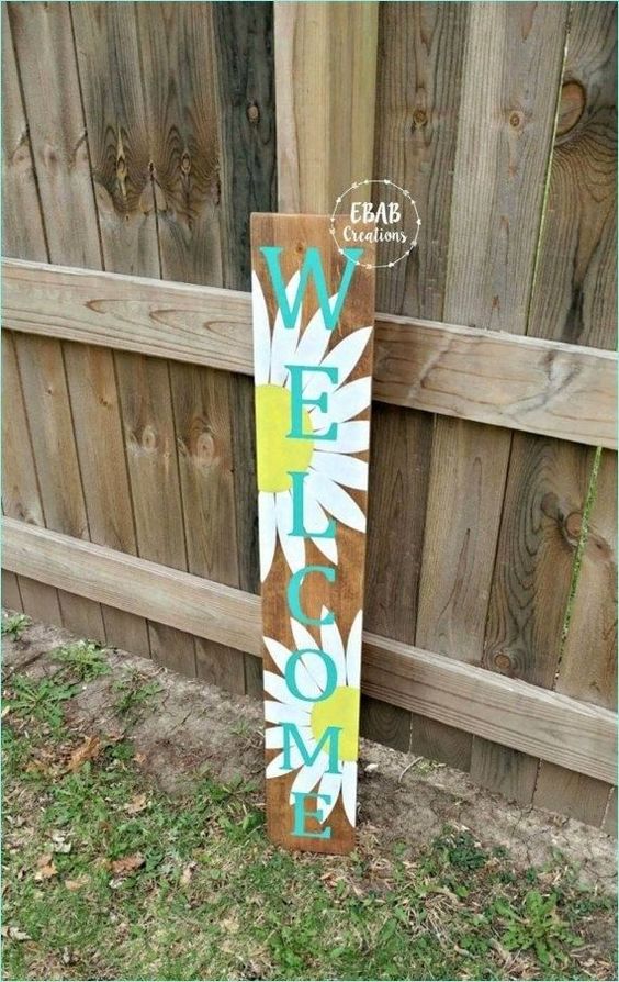a bright spring sign with letters and blooms is a lovely and chic idea for spring, feels rustic