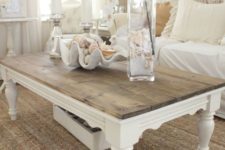 an elegant low farmhouse coffee table and a low drawer under it to store some small stuff