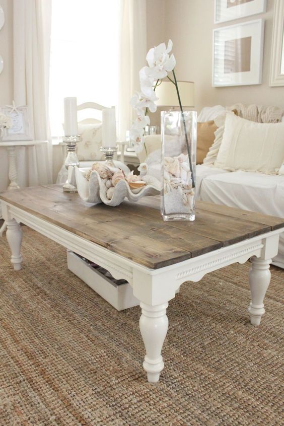 an elegant low farmhouse coffee table and a low drawer under it to store some small stuff